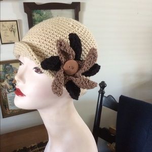 Crocheted hat with retro flower